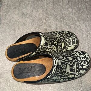 Sanita Black and Cream Lettered Clogs